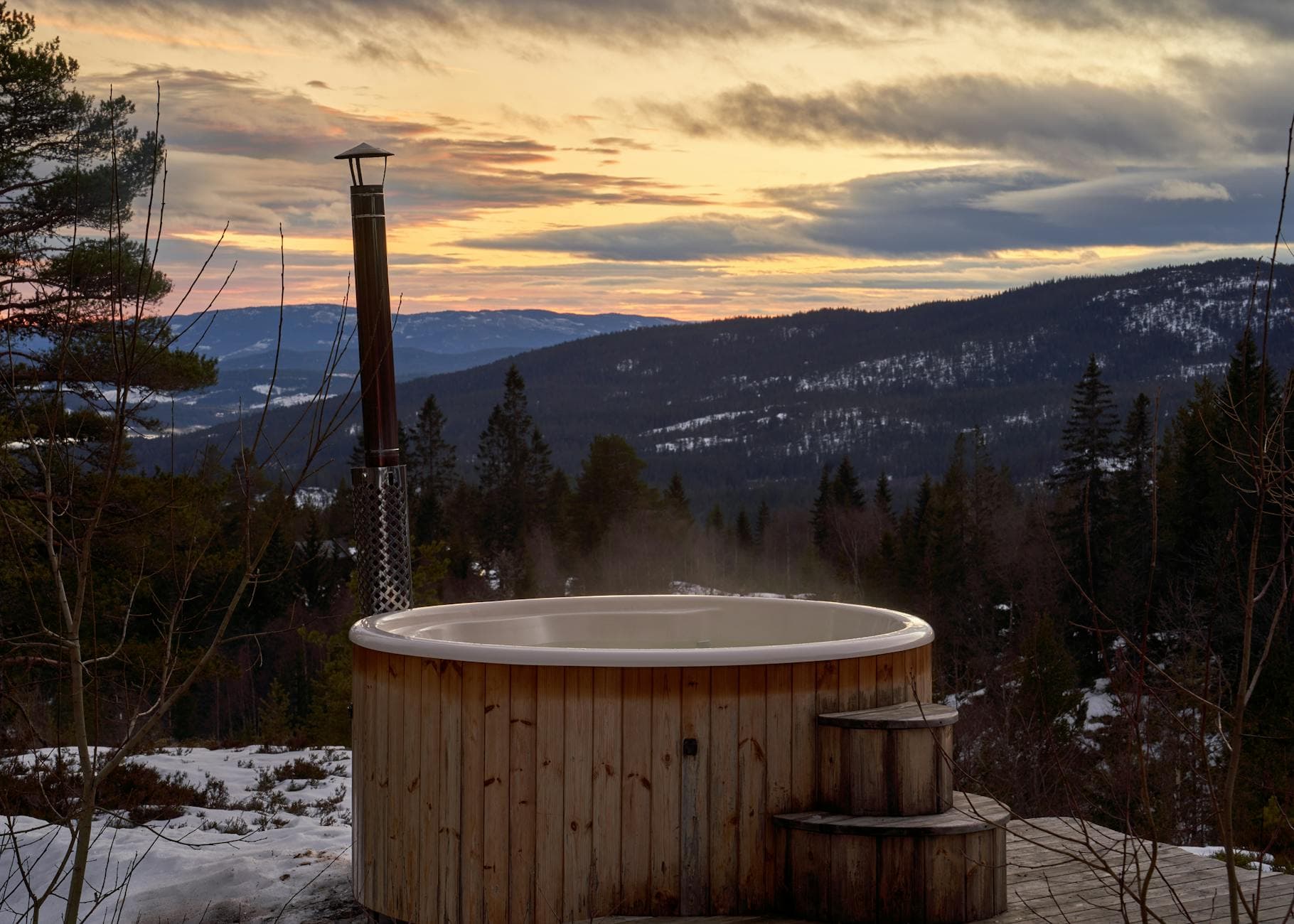 hydropool hot tub winter backyard snow - photo by Barnabas Davoti