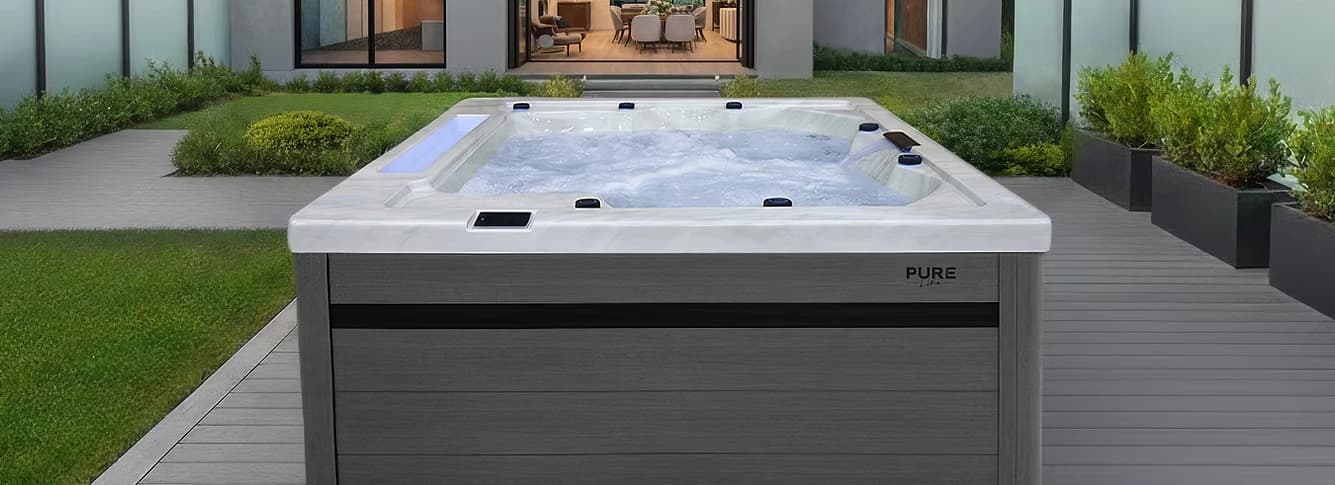 Maple Spas PureLine PL660 hot tub - modern square design in landscaped courtyard