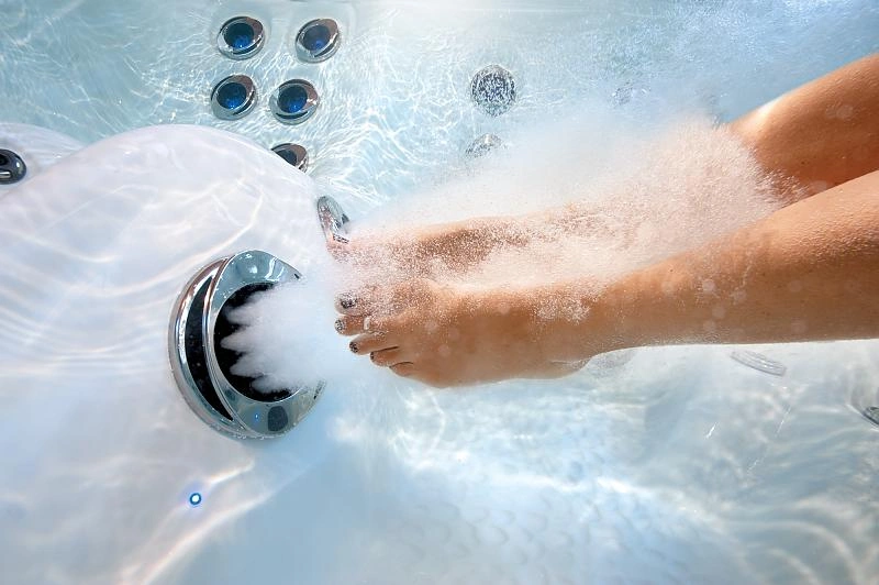 Be Well Canada Vulcano Jet hydromassage close-up with backlit jet faces