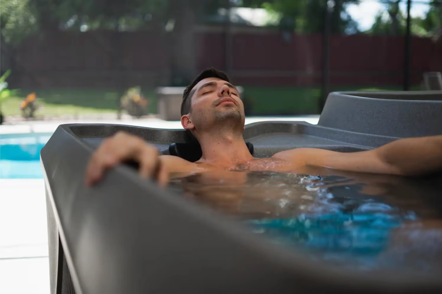 Owner relaxing in a DreamMaker hot tub at home - backed by local service for the life of the spa