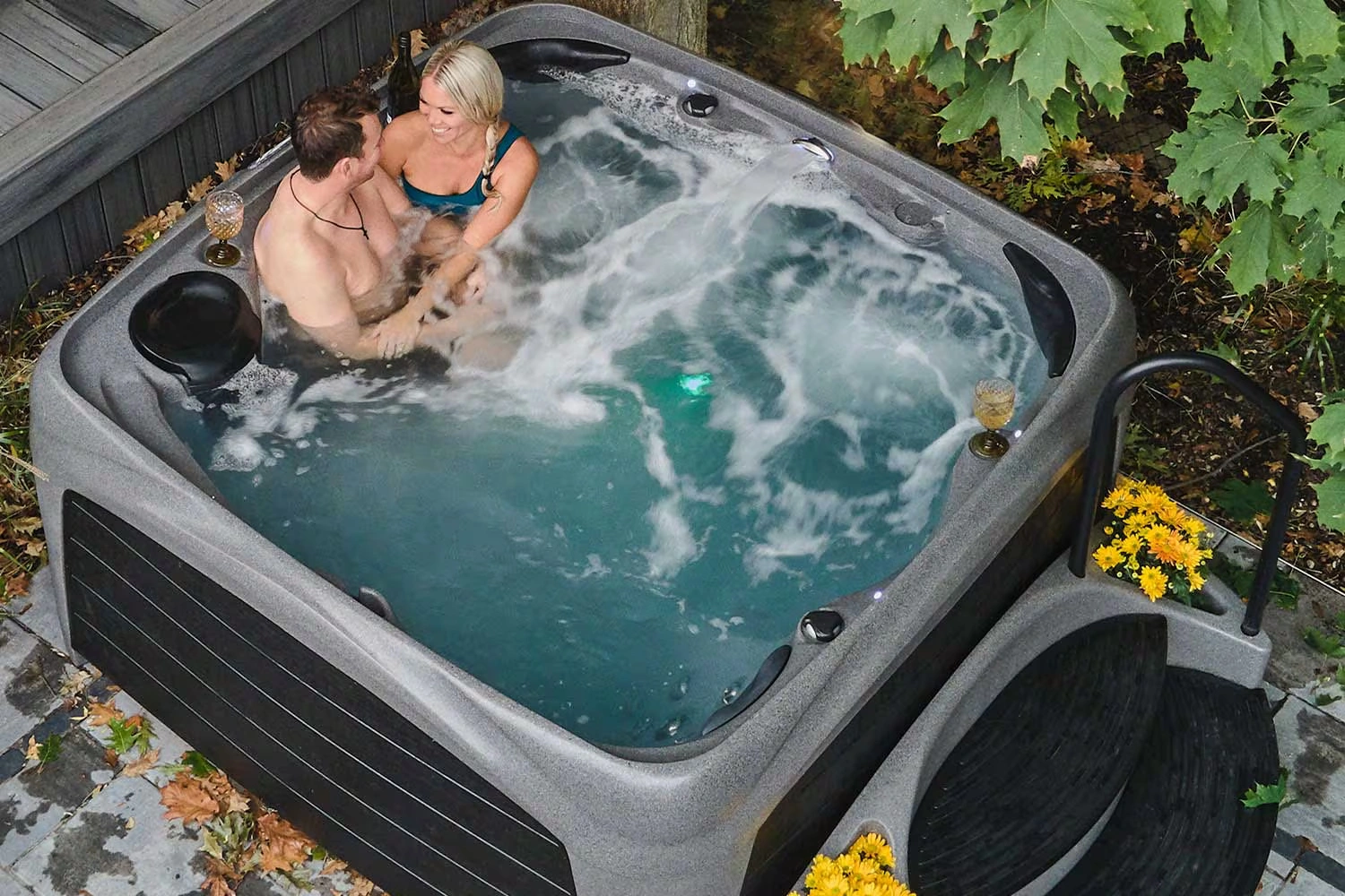 DreamMaker hot tub on a hillside patio overlooking the ocean - set up and soaking the same day