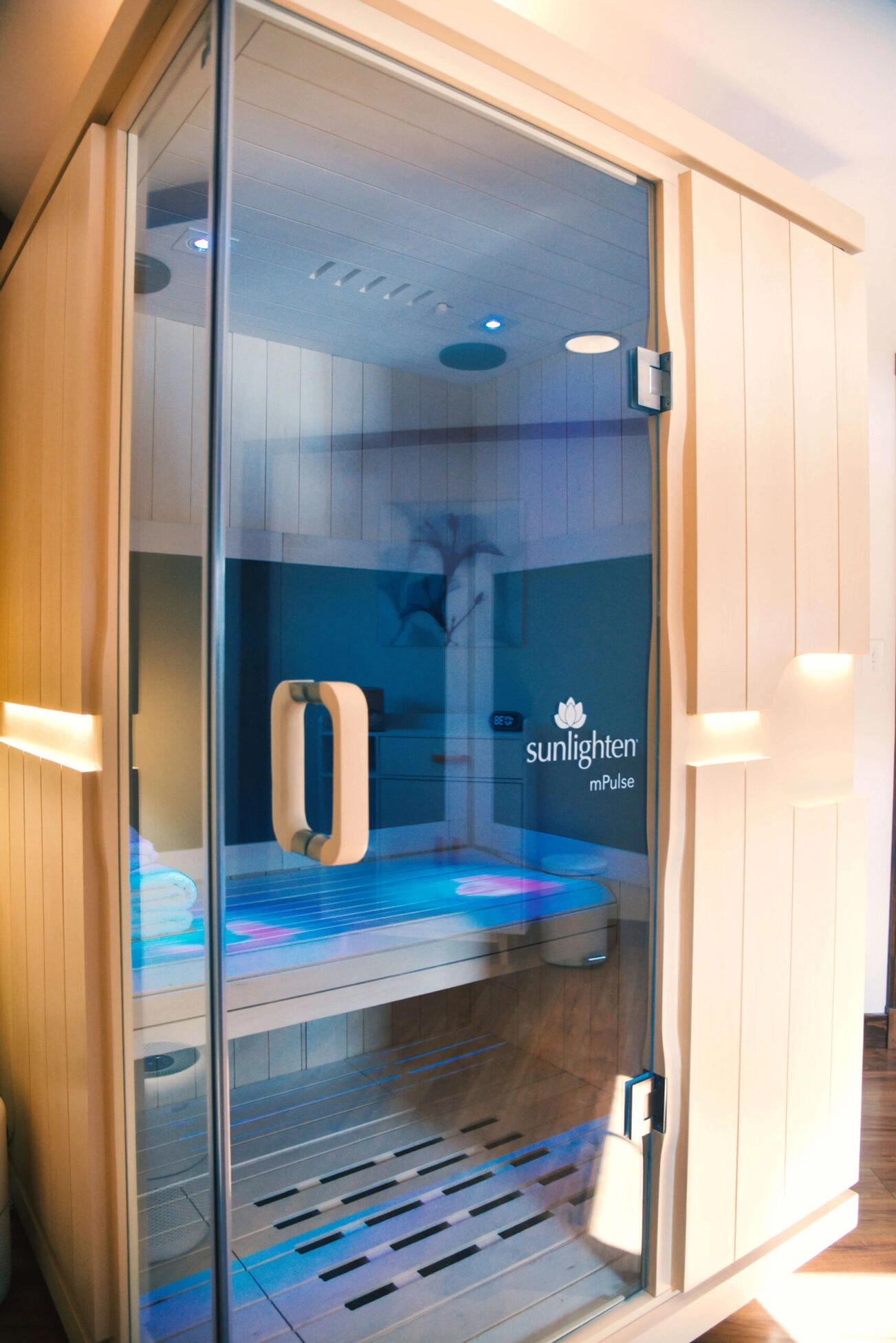 Person relaxing in Sunlighten sauna
